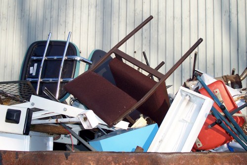 Truck hauling demolition debris in Norbiton